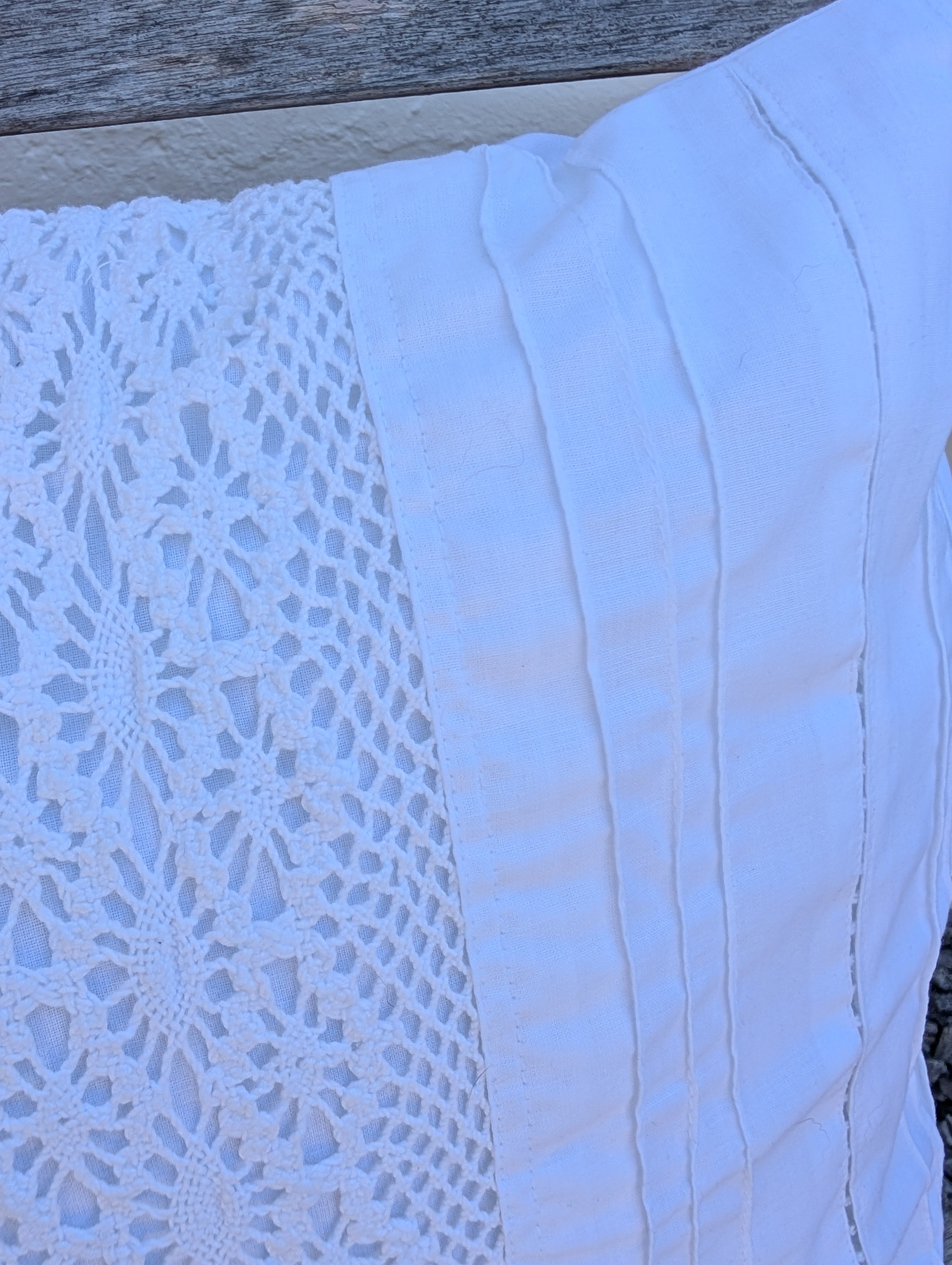 Vintage shabby chic lace cushion cover with decorative floral design, ideal as a cozy throw pillow accent.