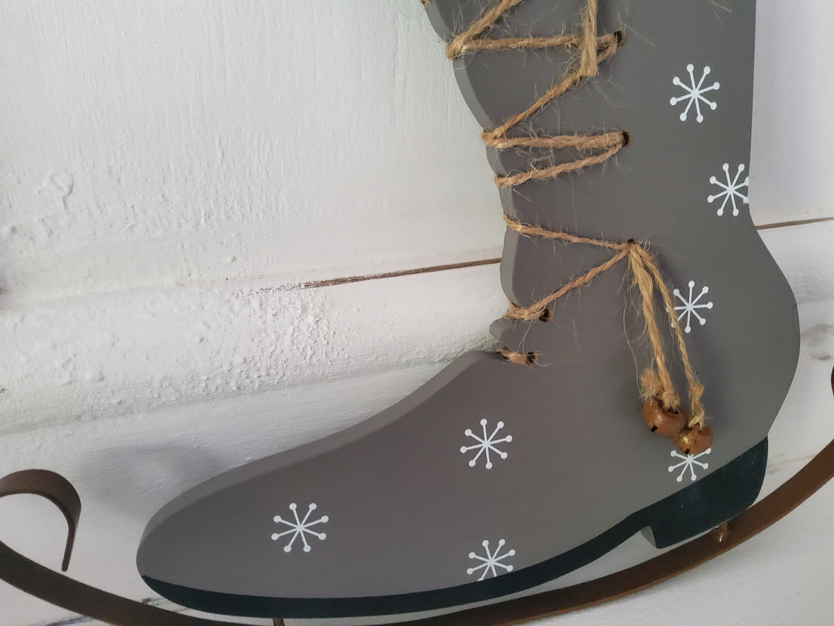 Vintage wooden Christmas ice skate hanging decoration from shabbychicdecor.co.uk, 24x22cm, featuring rustic holiday charm.
