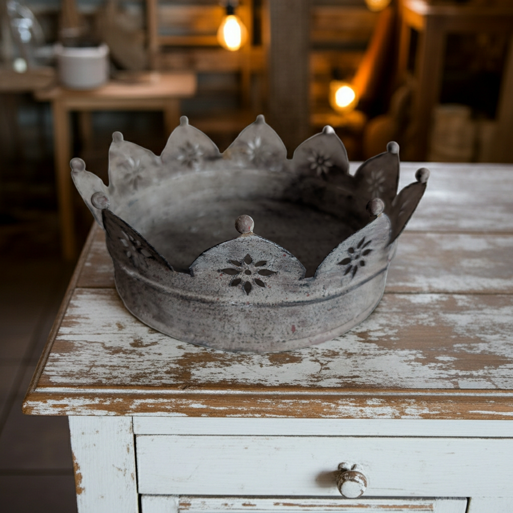 Vintage rustic metal crown with ornate shabby chic design, ideal as shabby chic table decor or decorative piece.