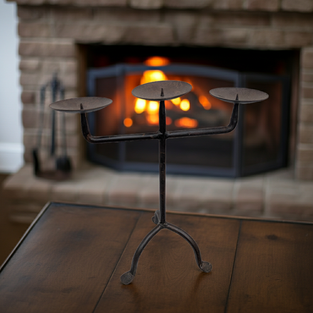 Vintage black metal 3-arm candelabra candle holder with shabby chic design, decorative and elegant for home decor.
