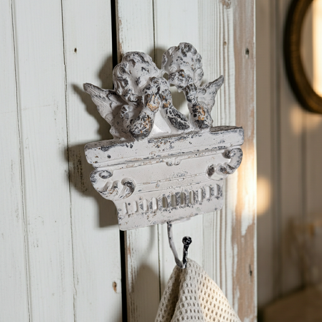 Vintage shabby chic angel towel holder with a cherub cast wall hook, decorative wall mount for bathroom or kitchen.
